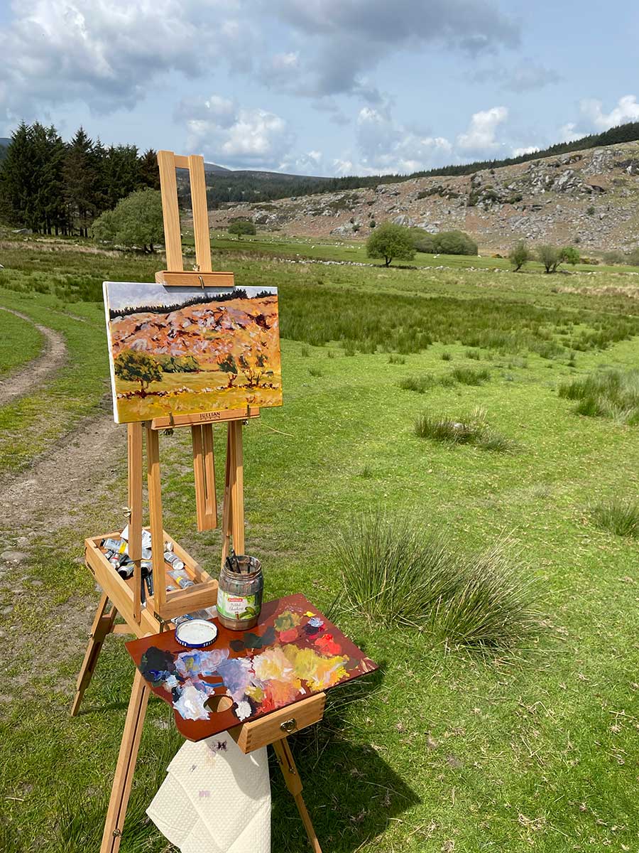 Painting in progress on easel on location in Lough Dan
